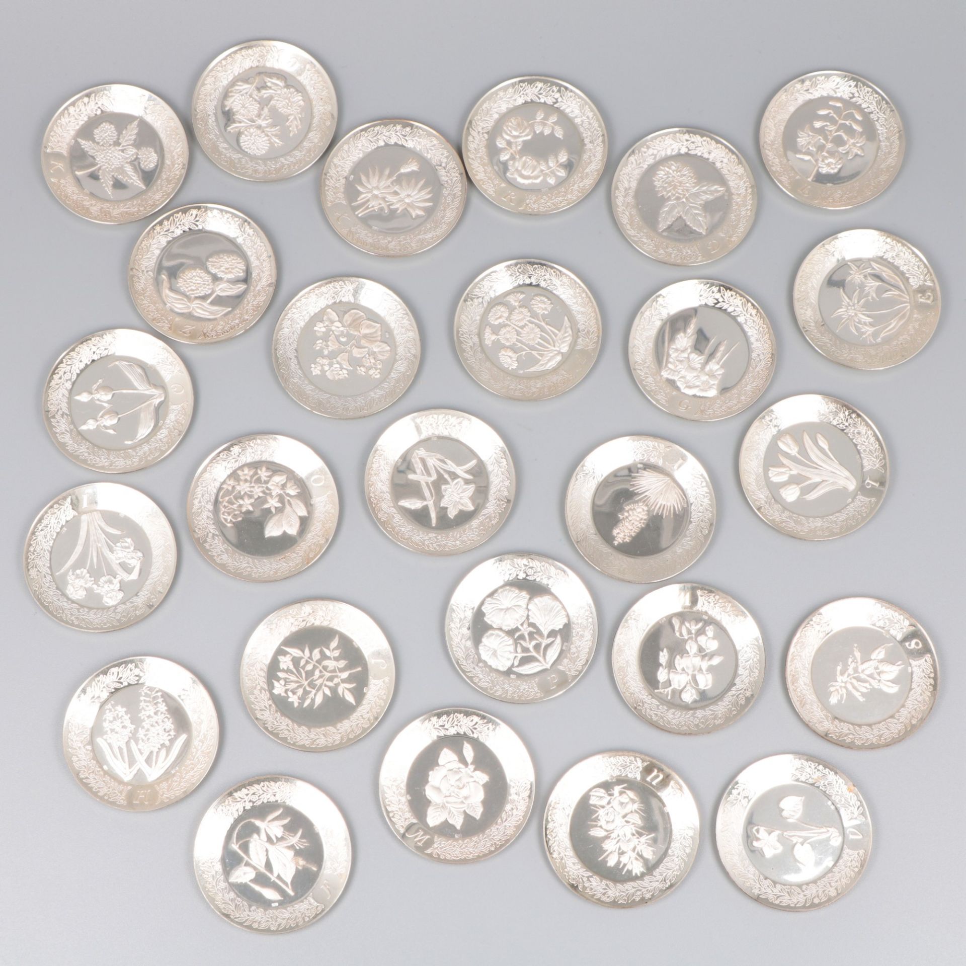 26-piece "Flower alphabet" miniature plates, silver.