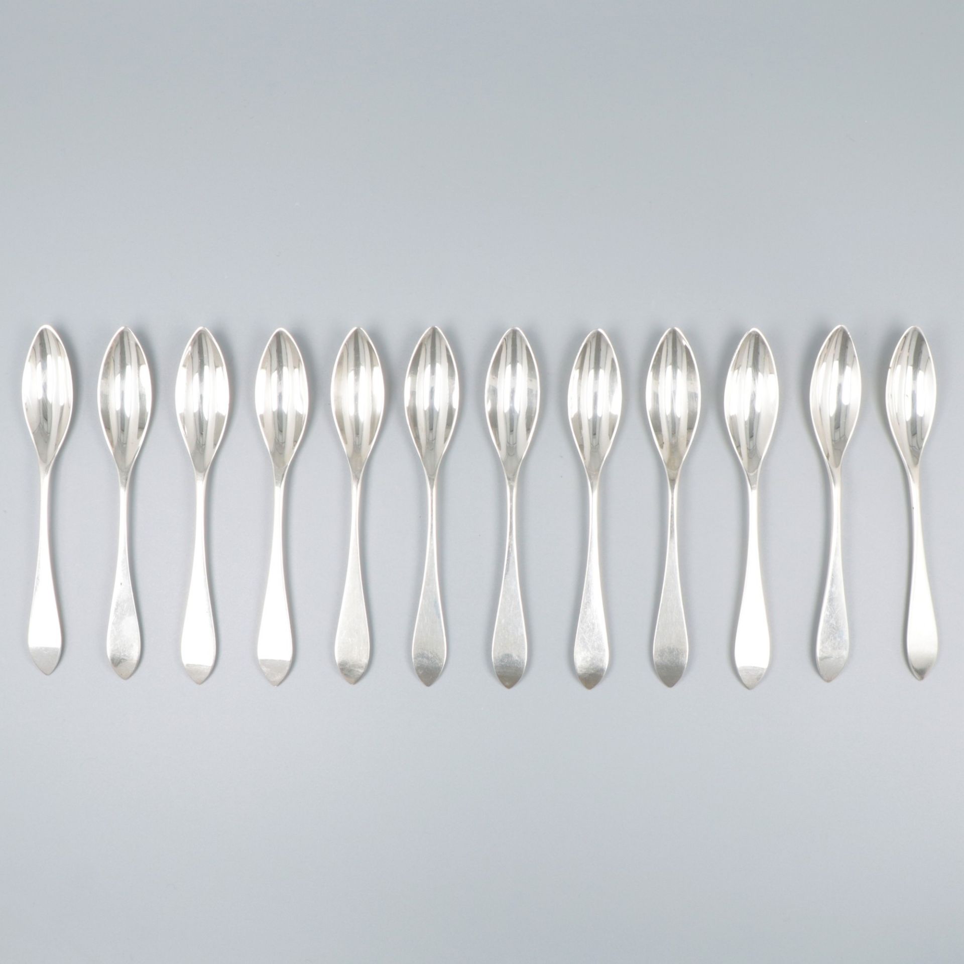 12-piece silver teaspoon set.