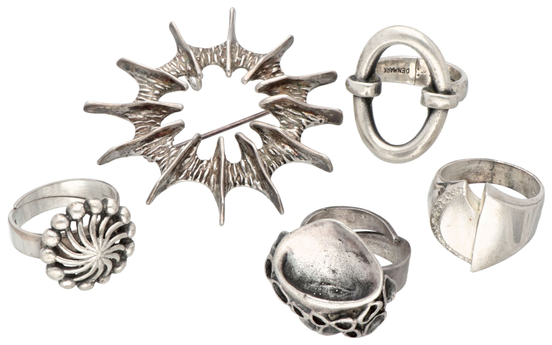 Lot of five silver Scandinavian design rings and brooch.