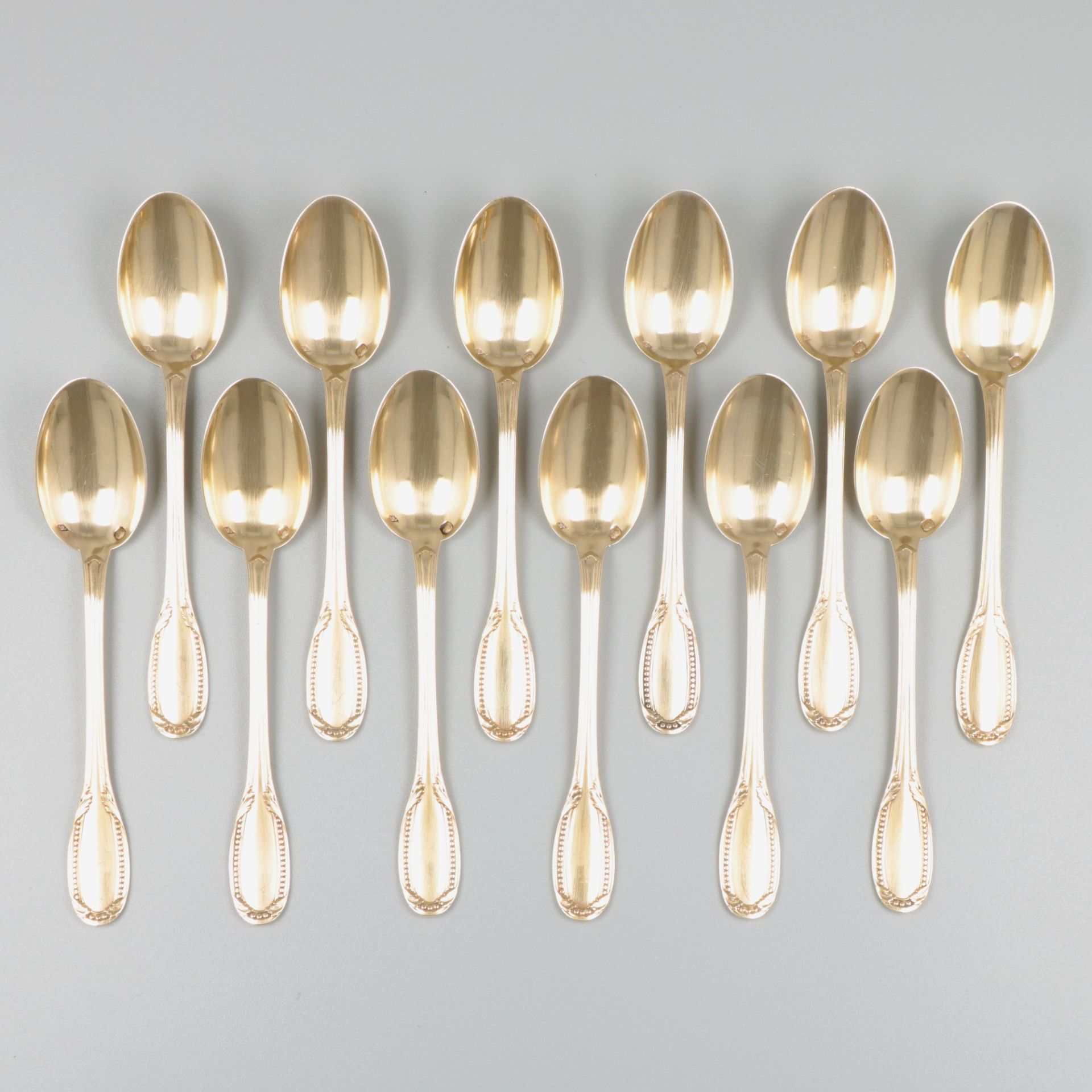 12-piece silver teaspoon set.