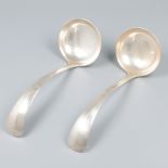 2-piece set of sauce spoons "Haags Lofje", silver.