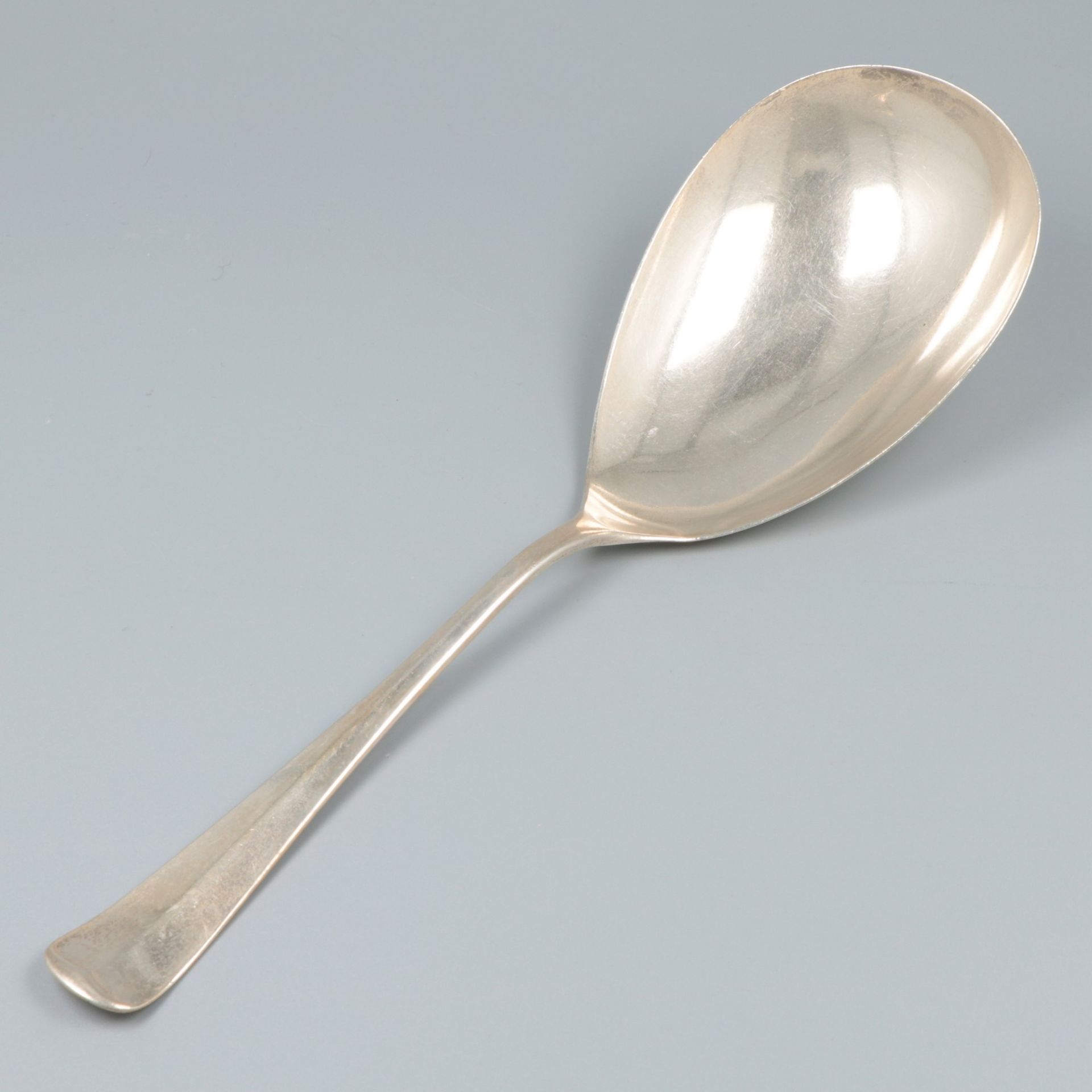 Rice serving spoon "Haags Lofje" silver.