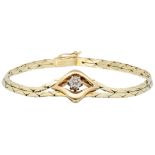 14K yellow gold flexible bracelet with diamond rosette.