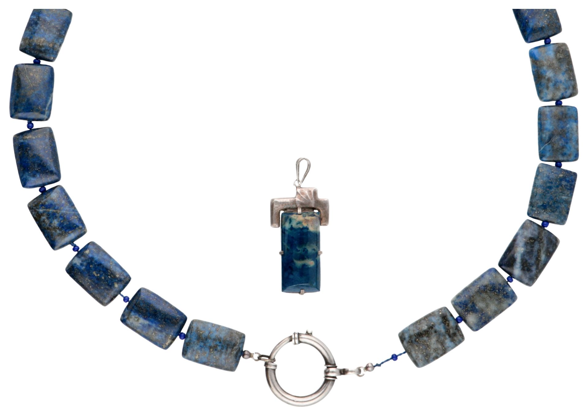 Lapis lazuli necklace and pendant with silver closure.