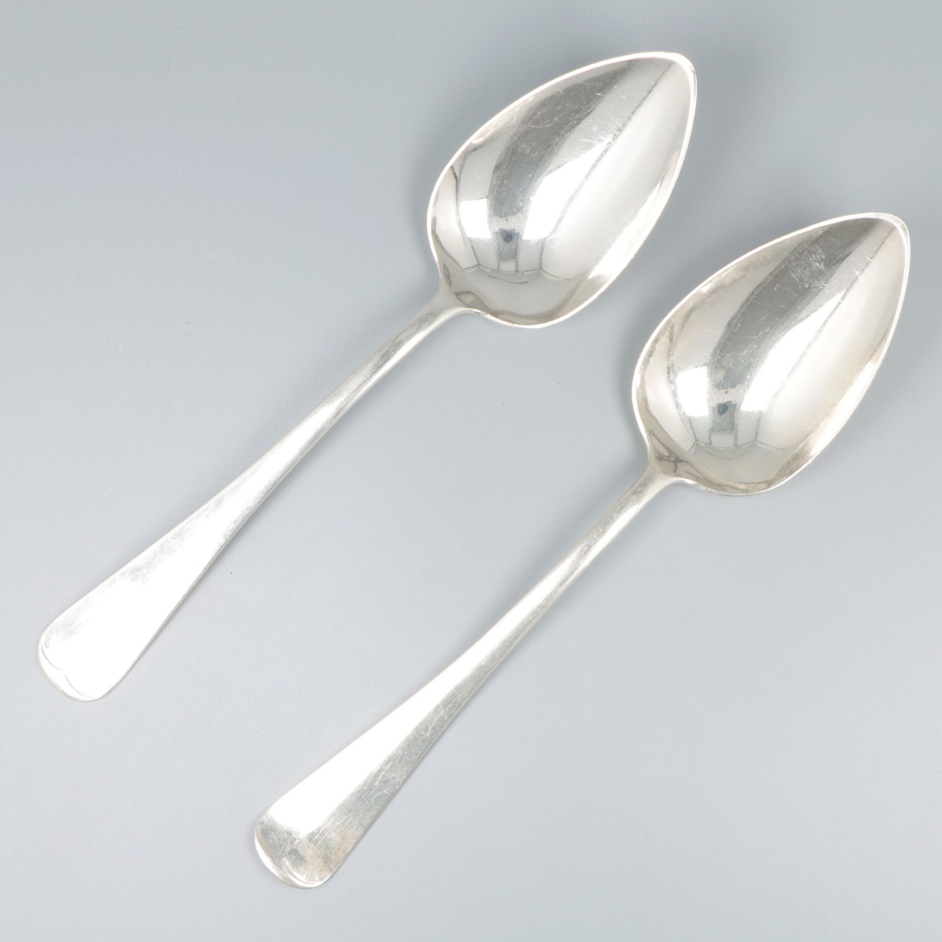2-piece set vegetable serving spoons "Haags Lofje", silver.