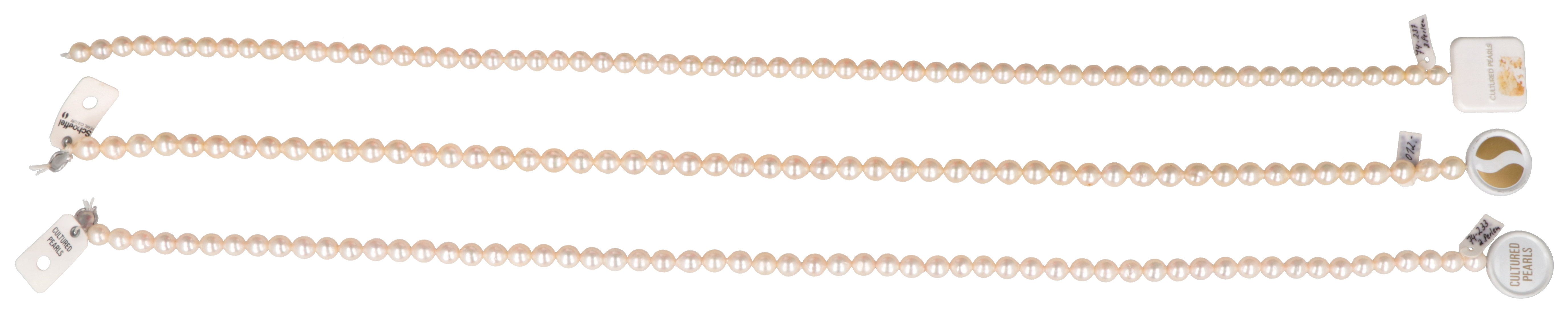 Three Schoeffel loose strands of cultivated Akoya pearls.