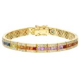 18K Yellow gold rainbow bracelet set with sapphires and approx. 1.20 ct. diamond.