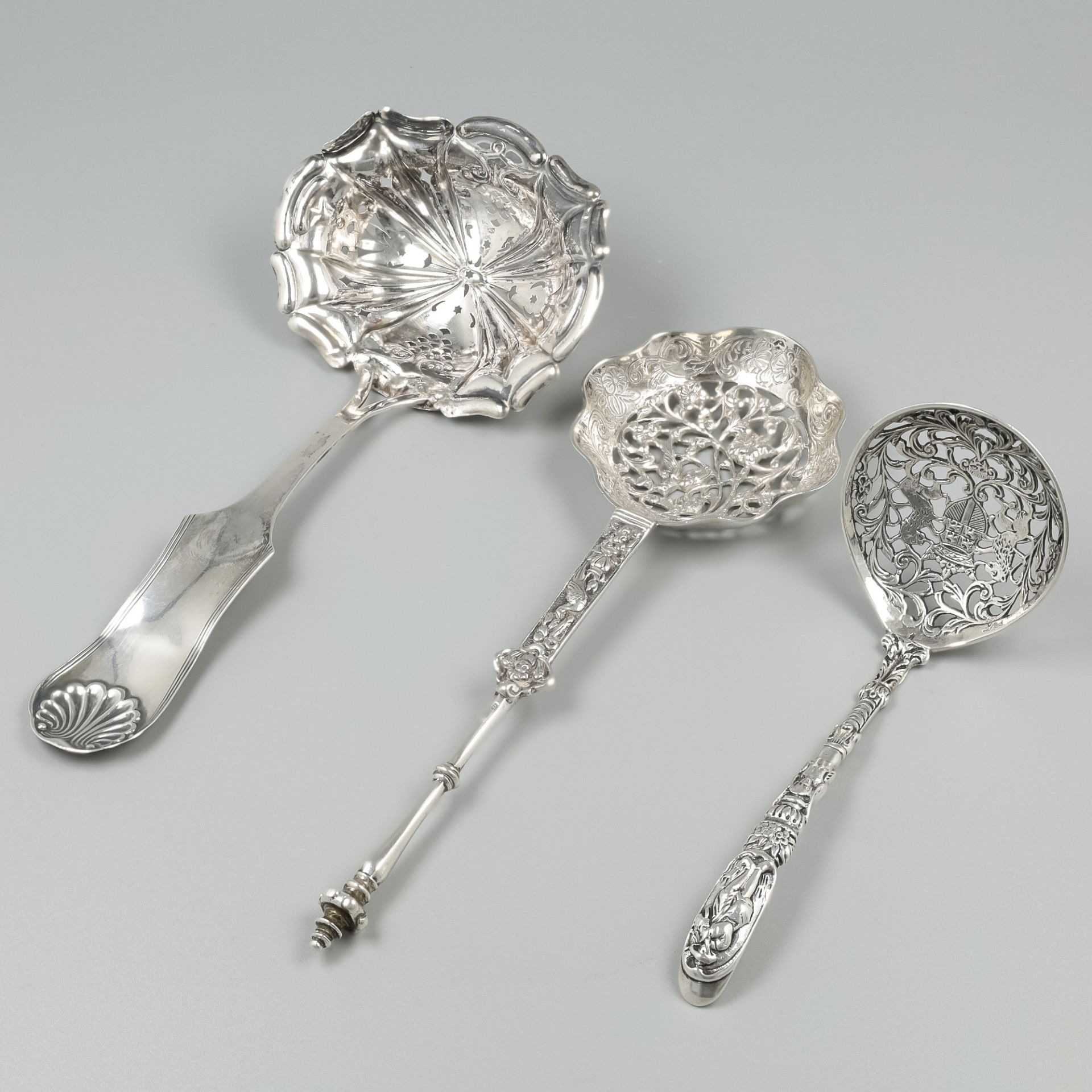 3-piece lot of silver sifter spoons.