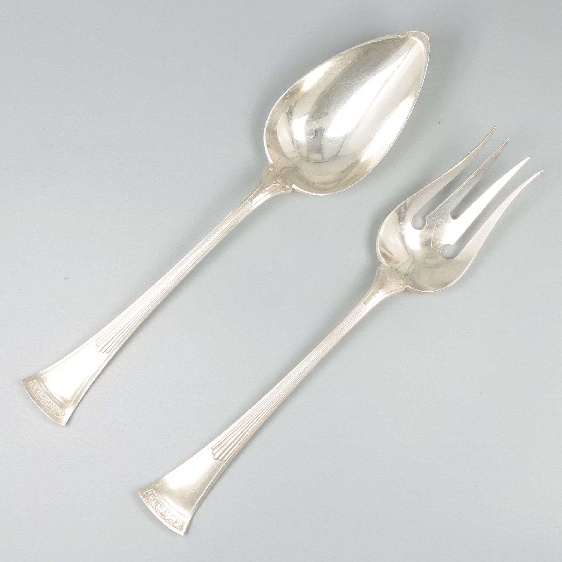 Salad servers silver.