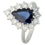 Platinum entourage ring set with approx. 3.0 ct. natural sapphire and diamond.