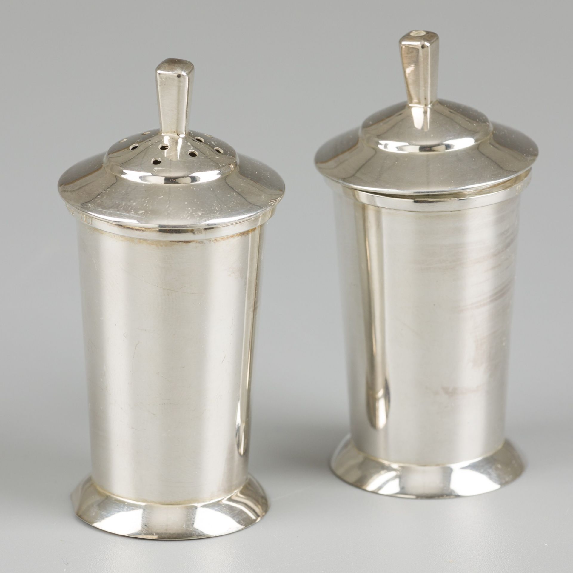 Pepper and salt shakers, silver.