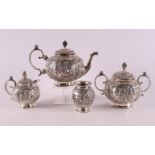 A four piece 2nd grade 835/1000 tea set, Louis XV style, early 20th century. Relief decoration of,
