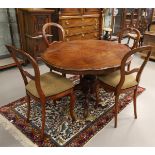 An oval dining room table, Holland, Willem III, 19th century. Mahogany, contoured top, resting on