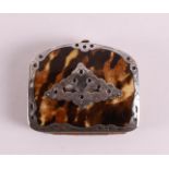 A rectangular tortoiseshell purse with second grade 835/1000 silver engraved fittings with floral