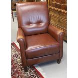 A brown sheep leather arm chair, 20th century.