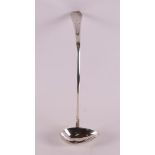 A 3rd grade 800/1000 silver sauce ladle, hammered decor, year letter 1923.