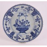 A blue and white porcelain dish, China, Kangxi, around 1700. Blue underglaze decoration of a