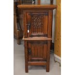 A neo-Gothic Bible cabinet, around 1900. Oak wood, profiled hood, carved front with Gothic motifs,