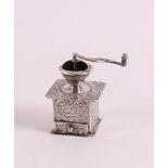 Etagere silver. A miniature coffee grinder, 20th century, h 4.5 cm.