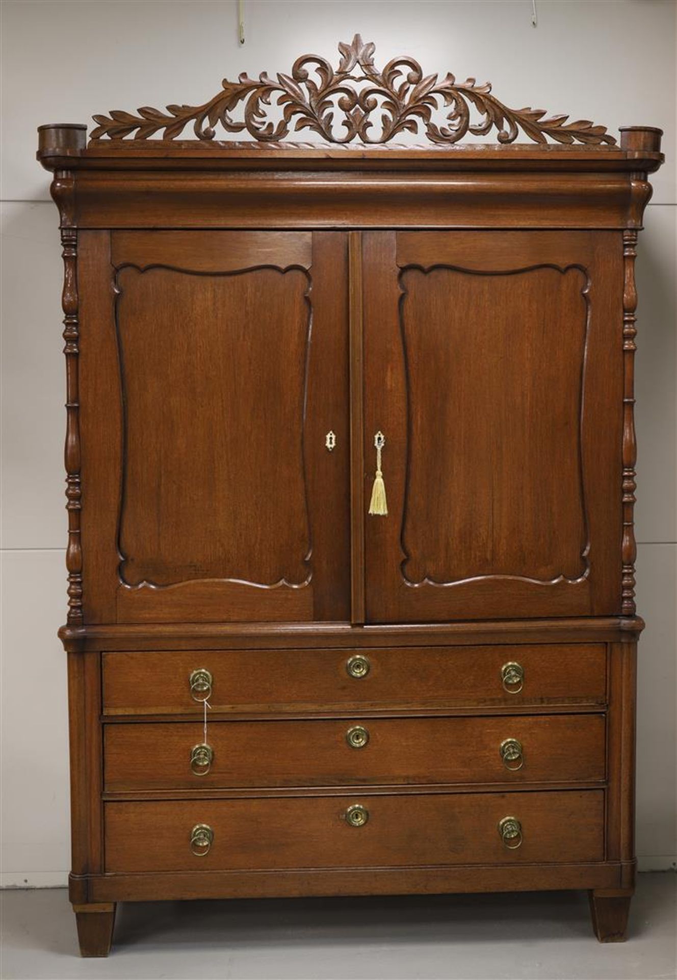 A cabinet, Friesland, 2nd half of the 19th century. Oak wood, straight profiled hood gallery,