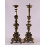 A pair of bronze single-light church candlesticks, 20th century. Fluted trunk, volute triangular