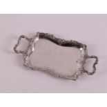 Etagere silver. A second grade 835/1000 silver miniature tray with handles, floral decoration.