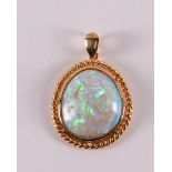 An 18 carat 750/1000 gold drop-shaped pendant, set with cabochon cut opal, gross weight 9.0 grams, l