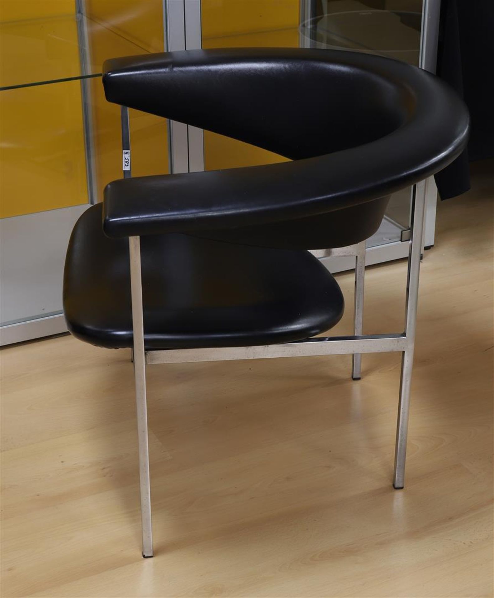 A semi-circular designer armchair 'Meander' with black skai upholstery, design: Rudof Wolf, 1962, - Image 2 of 2