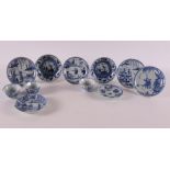 Three blue and white porcelain cups and eight saucers, China, 18th century. blue underglaze