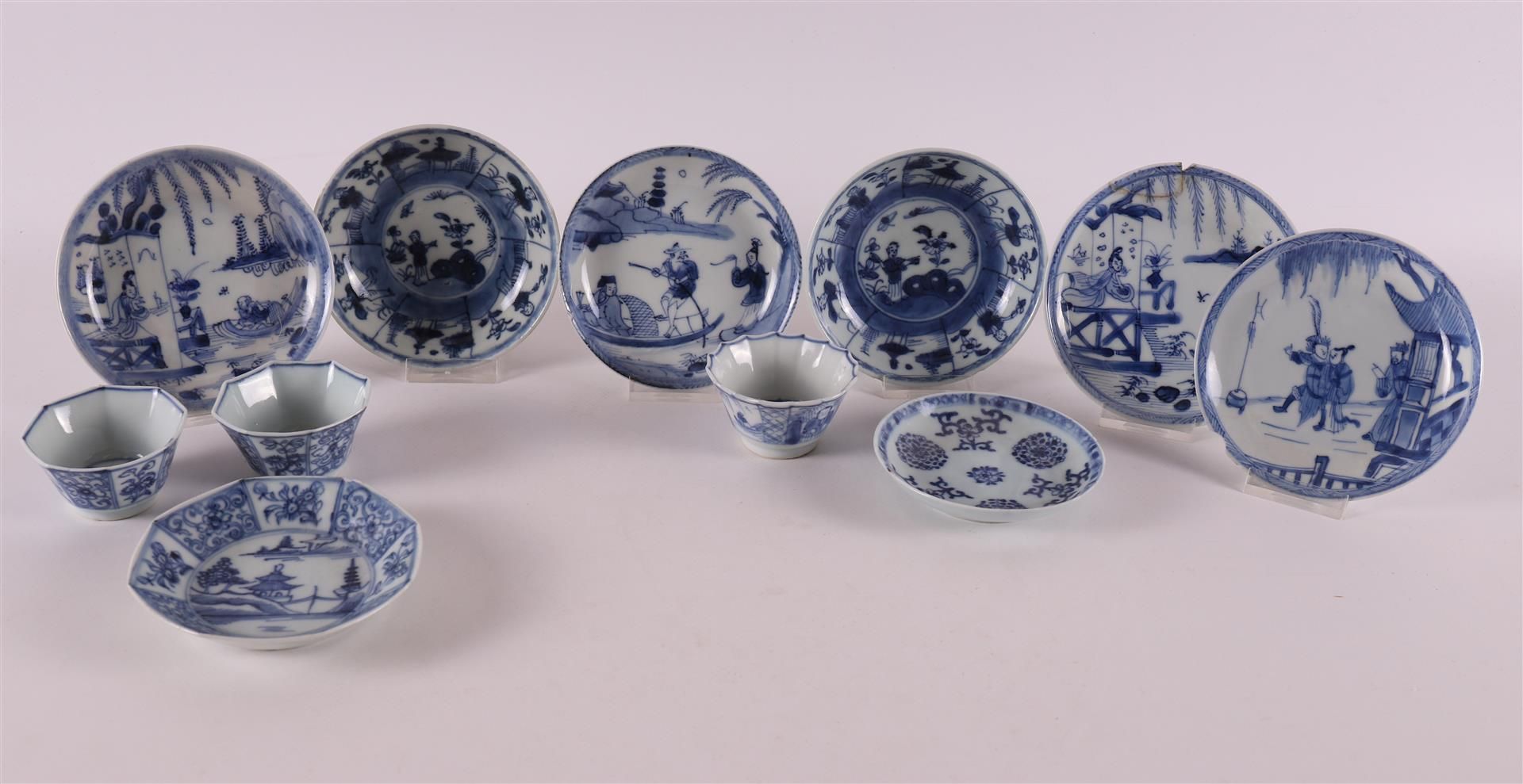 Three blue and white porcelain cups and eight saucers, China, 18th century. blue underglaze