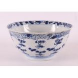 A blue and white porcelain bowl on a stand ring, China, Kangxi, around 1700. Blue underglaze