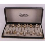 A set of eleven 2nd grade 835/1000 silver teaspoons, mid 20th century, tot. 11x.