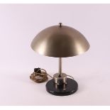 A nickel-plated vintage design lamp on a black metal base, ca. 1930. Attributed to Kurt Versen, h 35