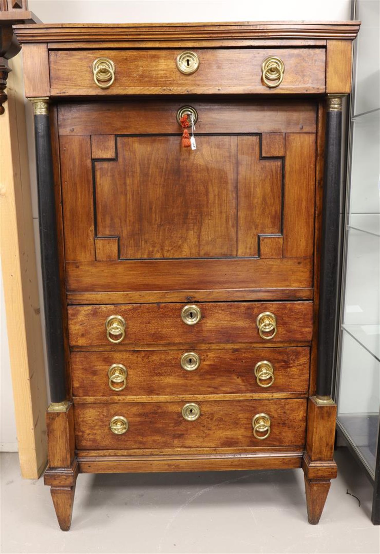 A secrétaireà abattant, Northern Netherlands, Neo Classicist, early 19th century. Oak wood, profiled
