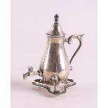 Etagere silver. A miniature tap jug, 20th century, h 5 cm.