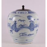 A blue and white porcelain lidded jar with wooden lid, China, Transition/Kangxi, 17th century.