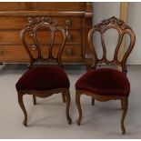 Seven mahogany dining room chairs with fabric upholstery, so-called 'Pretzel chairs', Dutch,