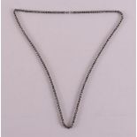 A second grade 835/1000 silver necklace, length 80 cm.