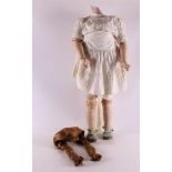 A limbed doll without porcelain head, Germany, ca. 1920. Marked: Kammer & Renhard, l82 cm.