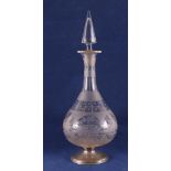 A baluster-shaped glass decanter on a second grade 835/1000 silver foot, 19th century. Decorated