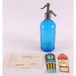 A blue glass spray bottle, factory H.R. Westra, Woudsend, ca. 1920. Including notes from the same