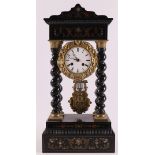 An ebonised glued column mantel clock, France, Napoleon Trois, ca. 1870. Capital and base with