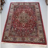 An Oriental carpet, 20th century, l 240 x w 170 cm.