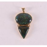 An 18 carat 750/1000 gold pendant, set with opal, gross weight 12.7 grams, l 4.6 x w 3.2 cm.