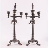 A pair of brown patinated bronze four-light candlesticks, France, 19th century, h 45 cm.