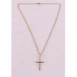 A 14 kt 585/1000 gold necklace with cross pendant, gross weight 5.9 grams.