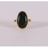 An 18 kt 750/1000 gold ring, set with oval cabochon cut opal, gross weight 6.8 grams, ring size