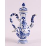 A blue and white porcelain jug, China, Kangxi, around 1700. Blue underglaze decoration of landscapes