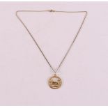 A 14 kt 585/1000 gold zodiac sign Leo on a ditto necklace, 4.5 grams.