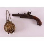 A double barrel pinfire pistol, 19th century. Including a brass powder canister with a double